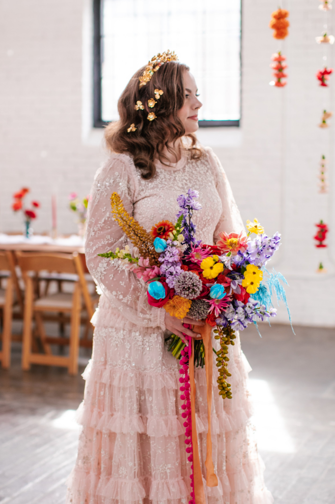 Bride with a colorful and eclectic bouquet